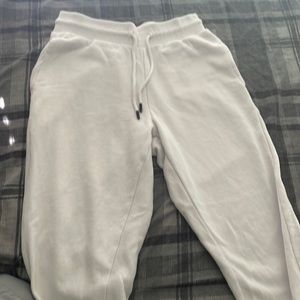 White fashion nova men sweat pants joggers size medium in new condition